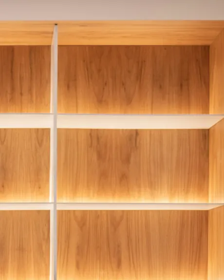 Oak shelving with warm hidden lighting